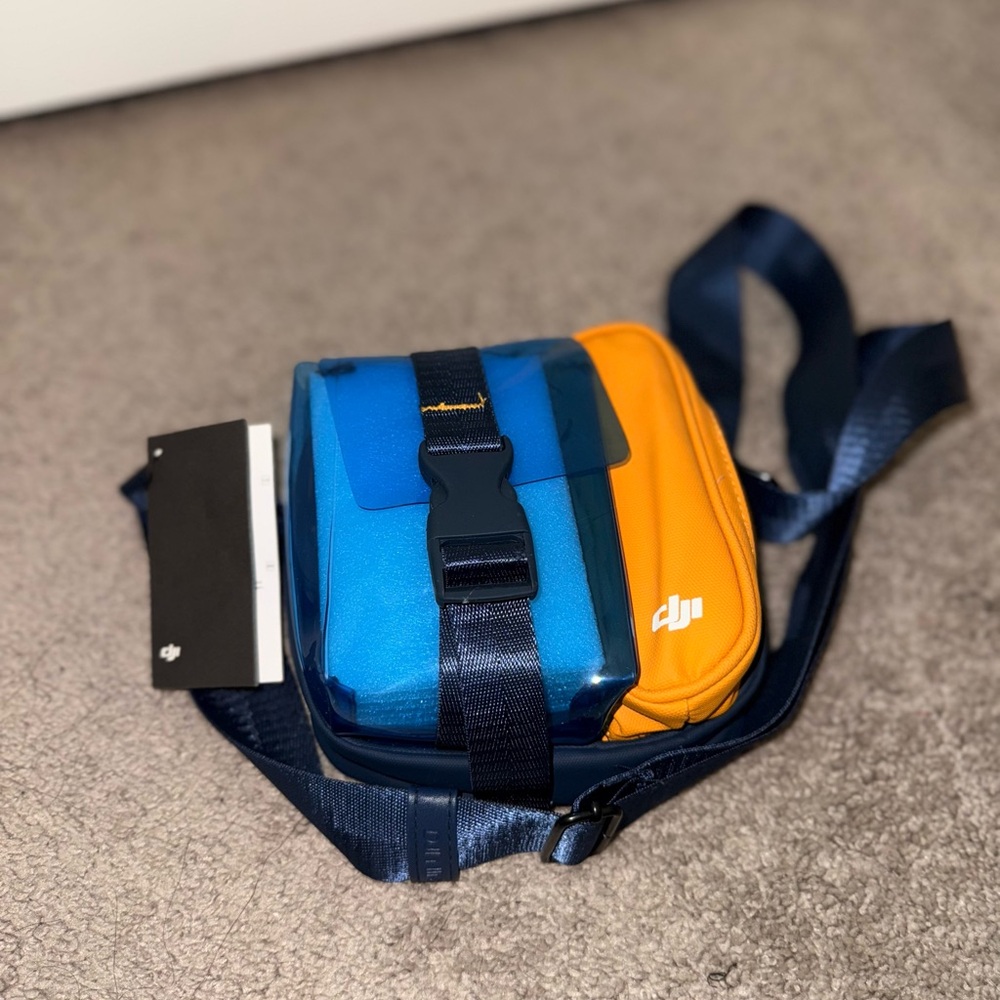 DJI Blue and Orange Messenger Bag with Sporty Design
